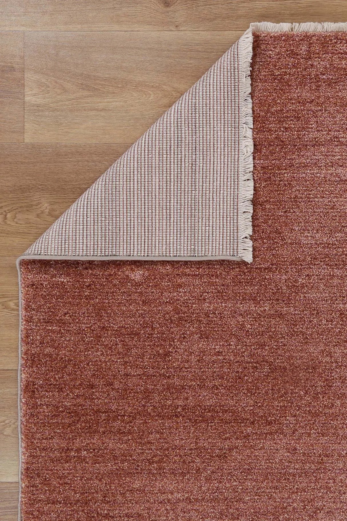 Aurora Rust Plain Rug Brand Ventures